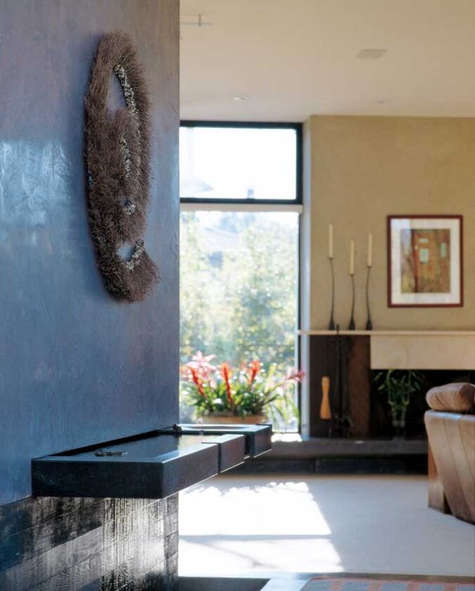 Cheng Designs created this water sculpture, an auditory component of the home’s intricate sensory design, for the entryway.